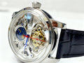 Montre mécanique à tourbillon et phasé de lune